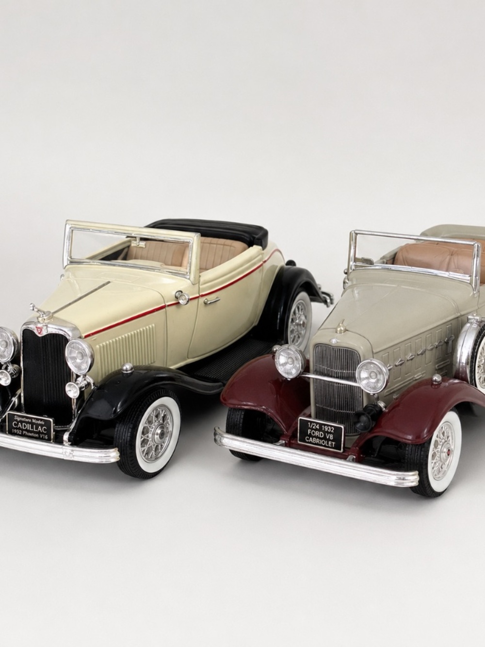 Set of two detailed classic convertible die-cast model cars,